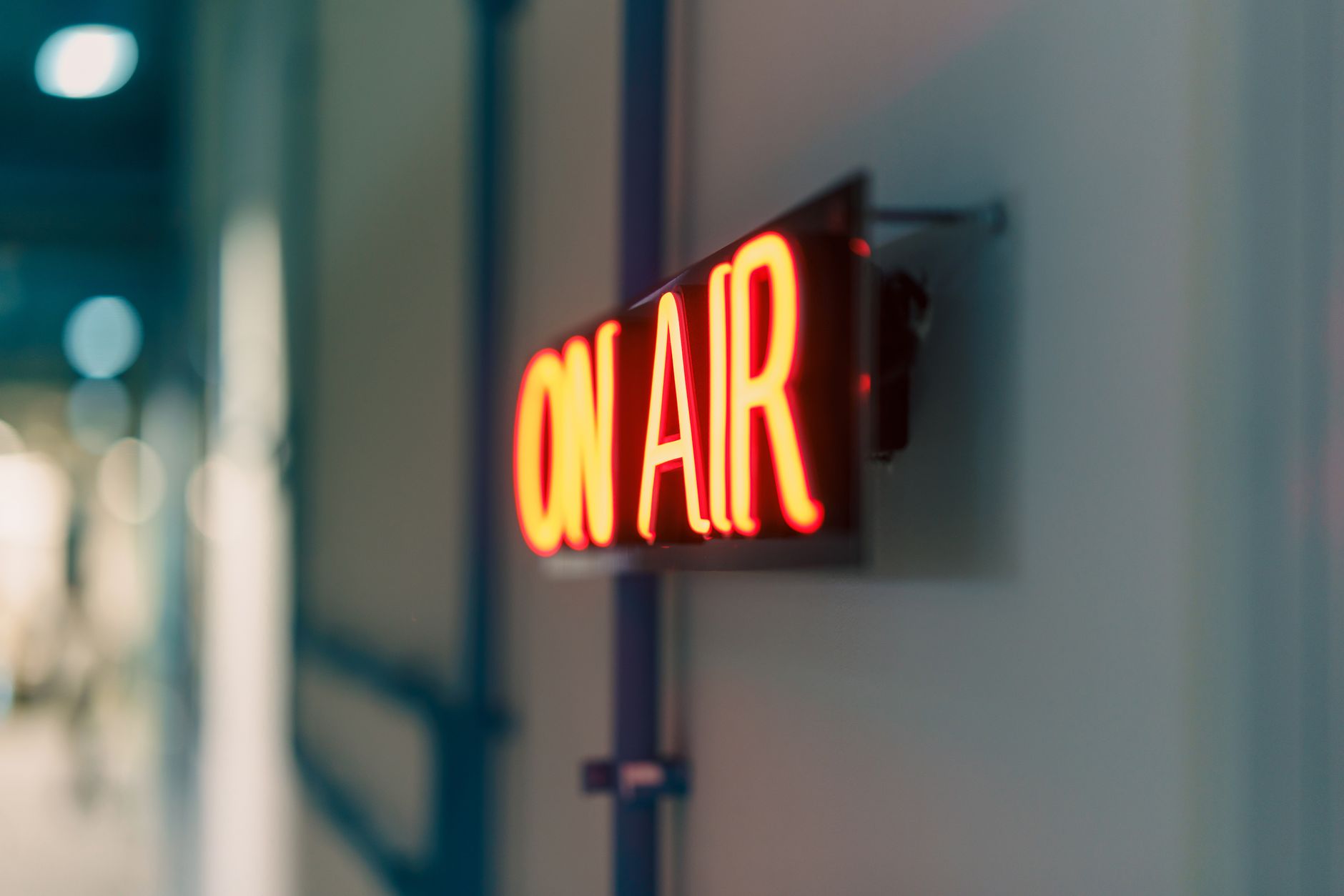 Bright red 'On Air' neon sign captured indoors, ideal for media content. — Boxing Streams Offer Ringside Viewing from Anywher