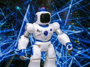 Advanced humanoid robot with glowing blue accents in a digital network setting. — How Artificial Intelligence Enhances Human-