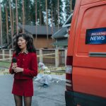 Female reporter in red outfit at an outdoor crime scene with warning tape and a news van. — The Path to Instagram Stardom: Bu